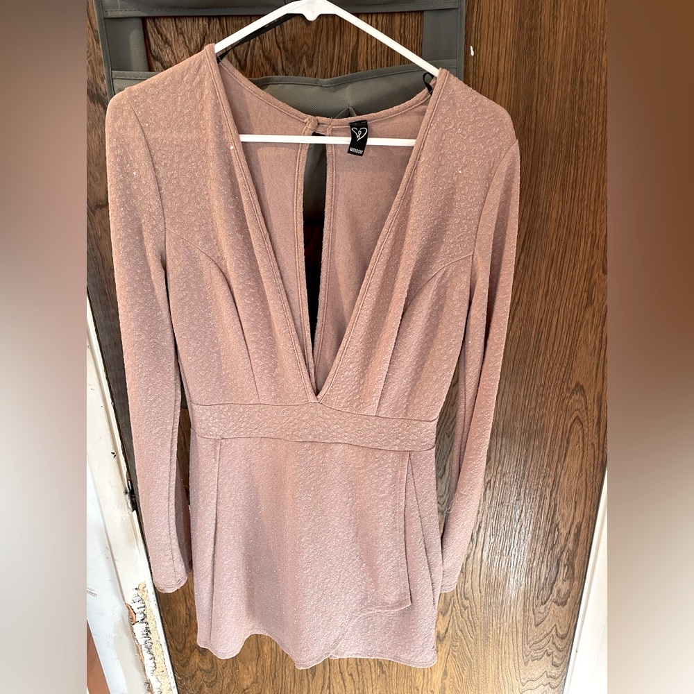 Barely worn nude sparkly romper. Perfect for new years!